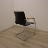 Vergaderstoel zwart leer en chroom slede frame