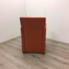 Fauteuil oranje kunstleer op wielen